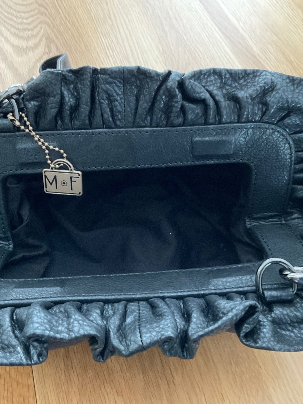 New Mary Frances bag black with stones on front.